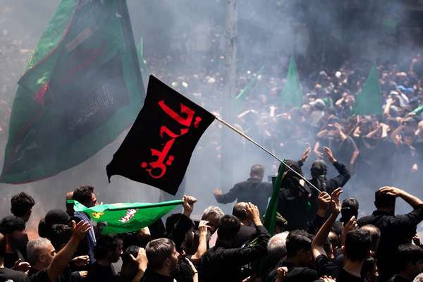 Rival visions of Iran take to the streets during Ashura