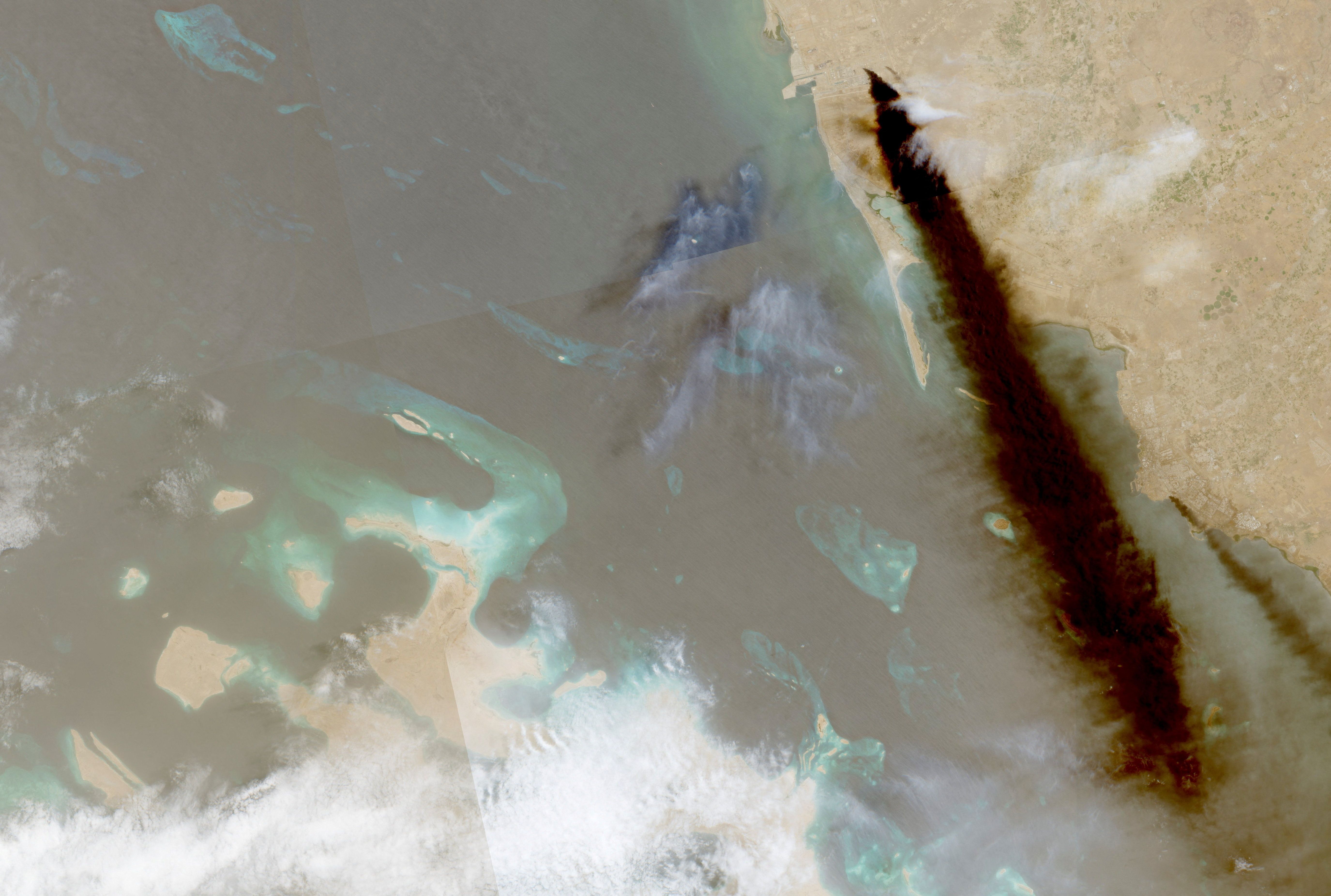 A composite satellite image shows trail of smoke rising from an oil facility, in Jizan, Jazan province, Saudi Arabia, July 26, 2026 after a Houthi attack.