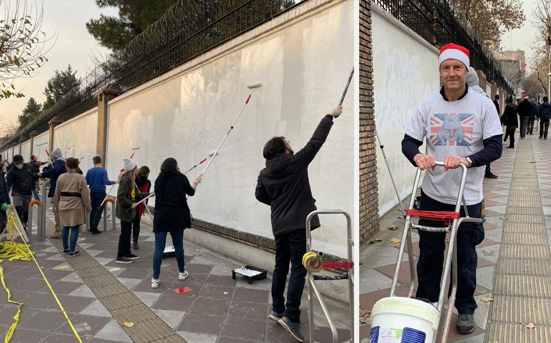 Volunteers In Iran Wipe Anti-UK Slogans Off Embassy Walls