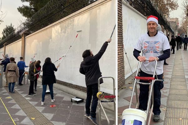 Volunteers In Iran Wipe Anti-UK Slogans Off Embassy Walls