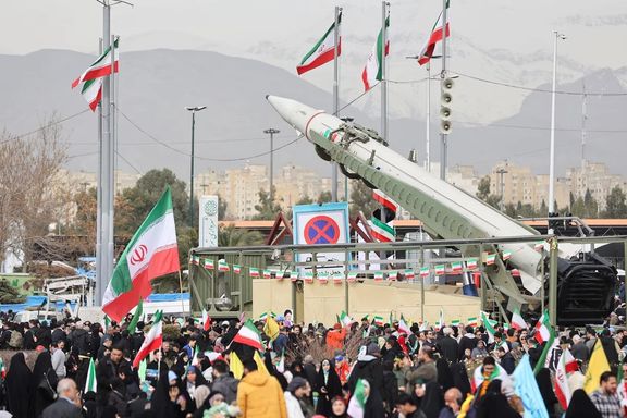 People gather near a missile on display during the 47th anniversary of the Islamic Revolution in Tehran, Iran February 11, 2026.