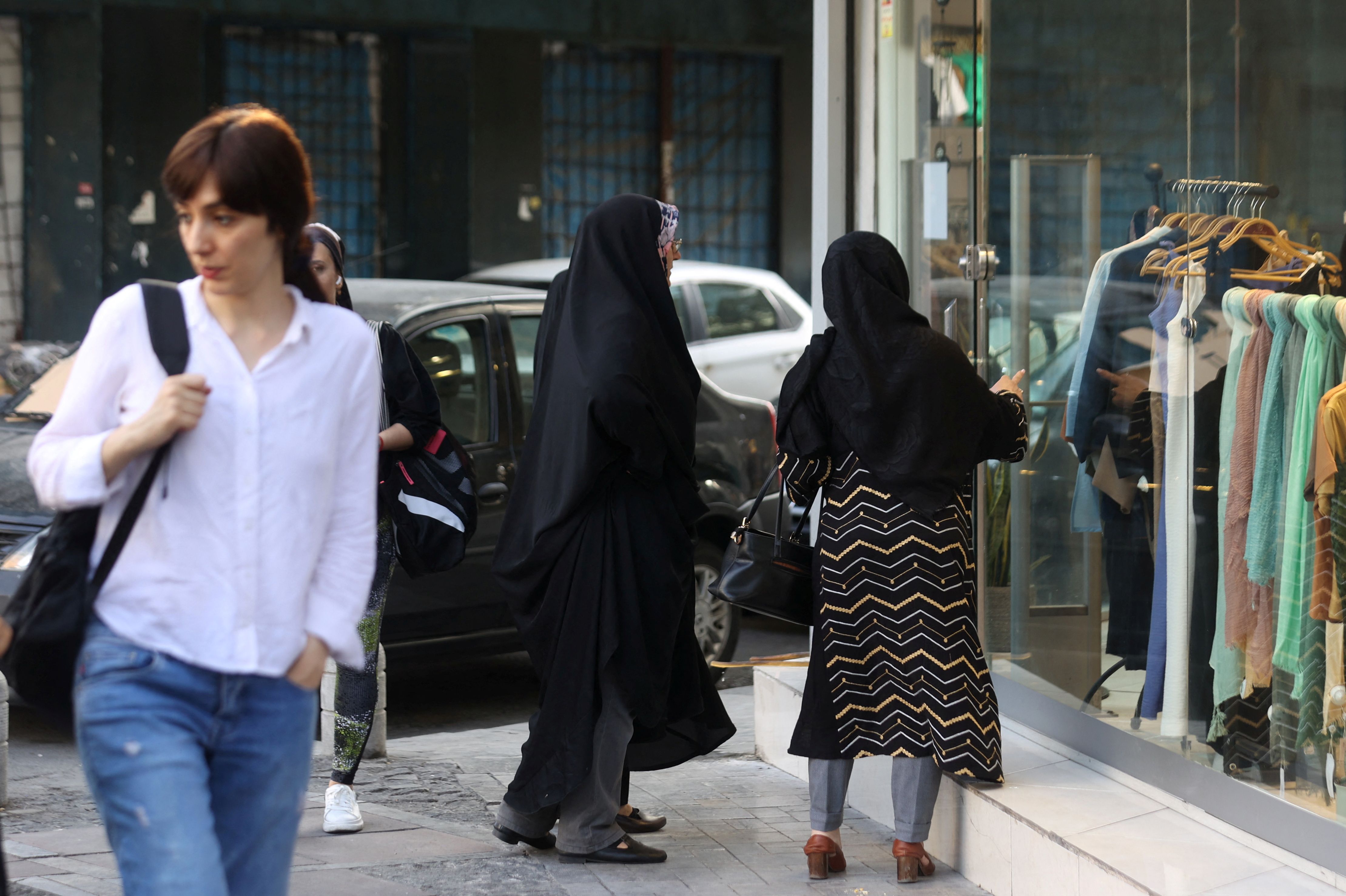 An Iranian woman without mandatory hijab on a street in Tehran (July 2023)