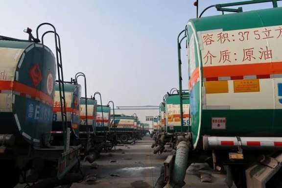 Oil tankers are seen in Shandong Haike Group in Dongying, Shandong province, China January 11, 2017.