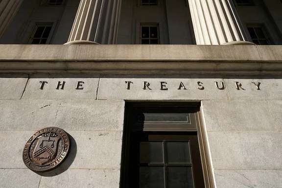 A view shows a bronze seal beside a door at the US Treasury building in Washington, US, January 20, 2023.
