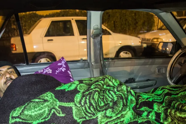 Behind the wheel, under the stars: The story of Tehran’s car-sleeping drivers