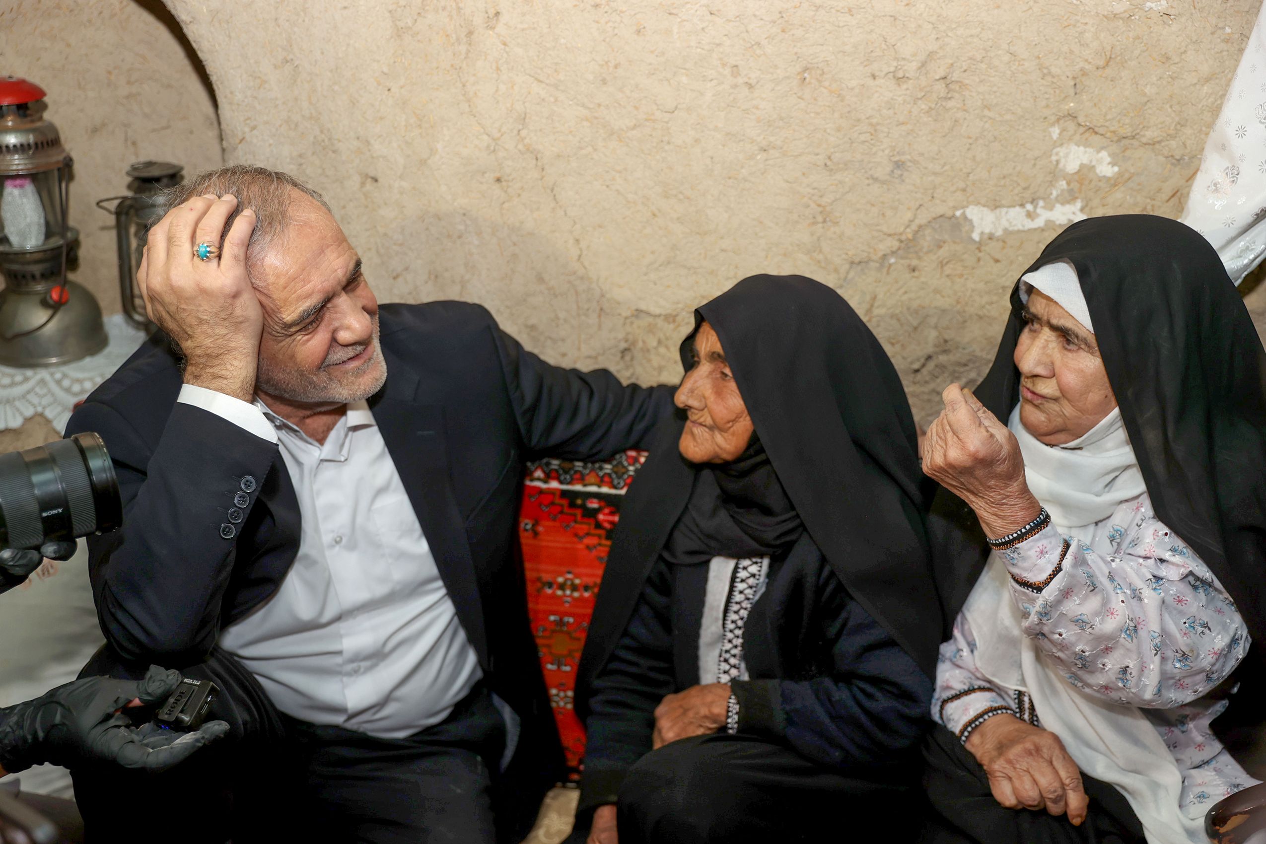 Iran's president decries public distrust as critics highlight decades of failures