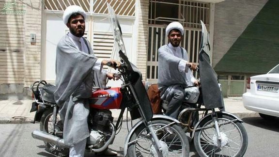 Young Iranian clerics using motorcycles to get around.