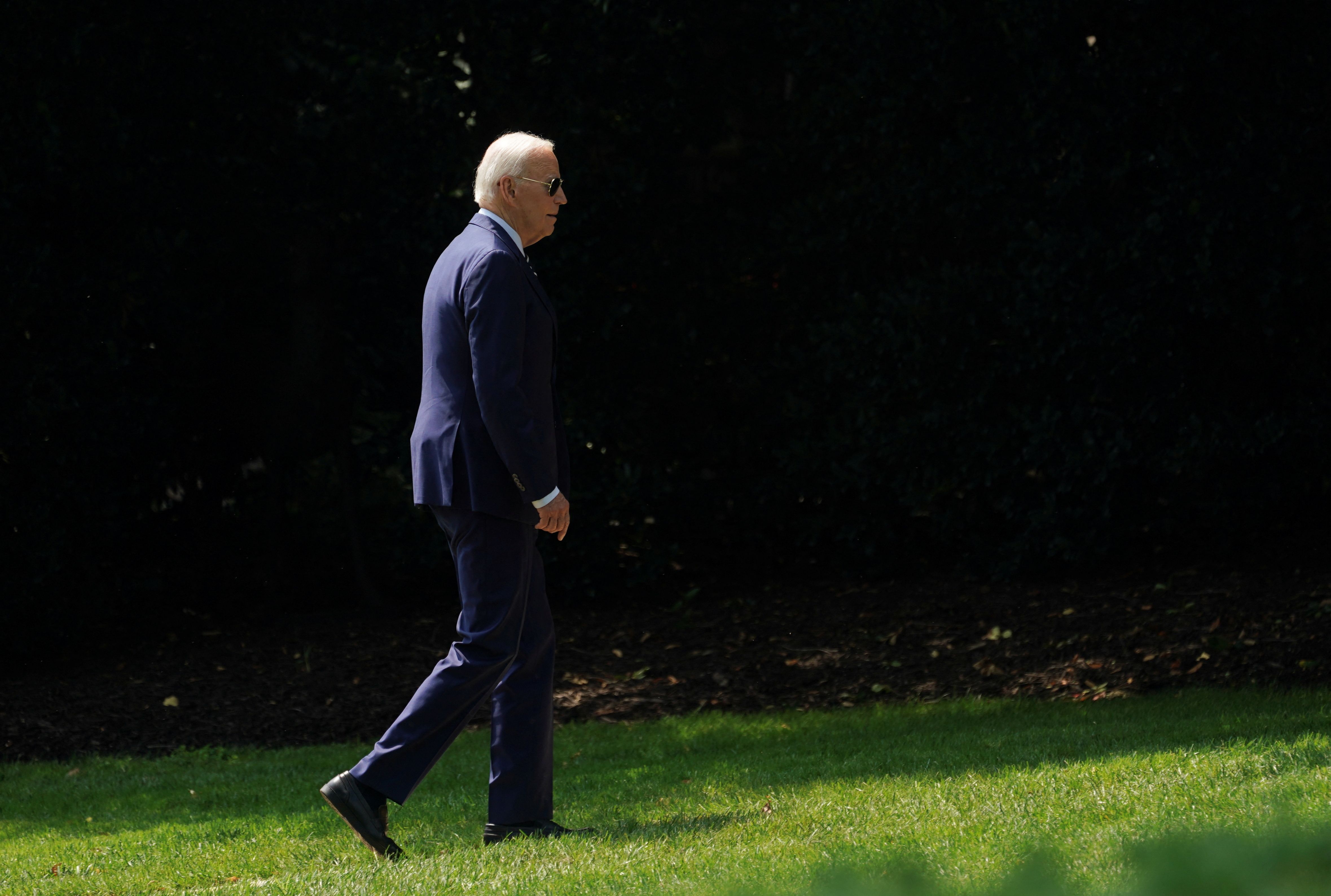 President Joe Biden walks toward the Oval Office upon his return from Wilmington to the White House in Washington, August 5, 2024.