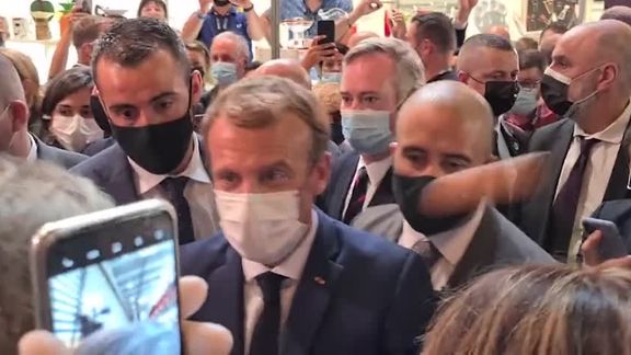 A protester threw an egg at Macron at a food fair