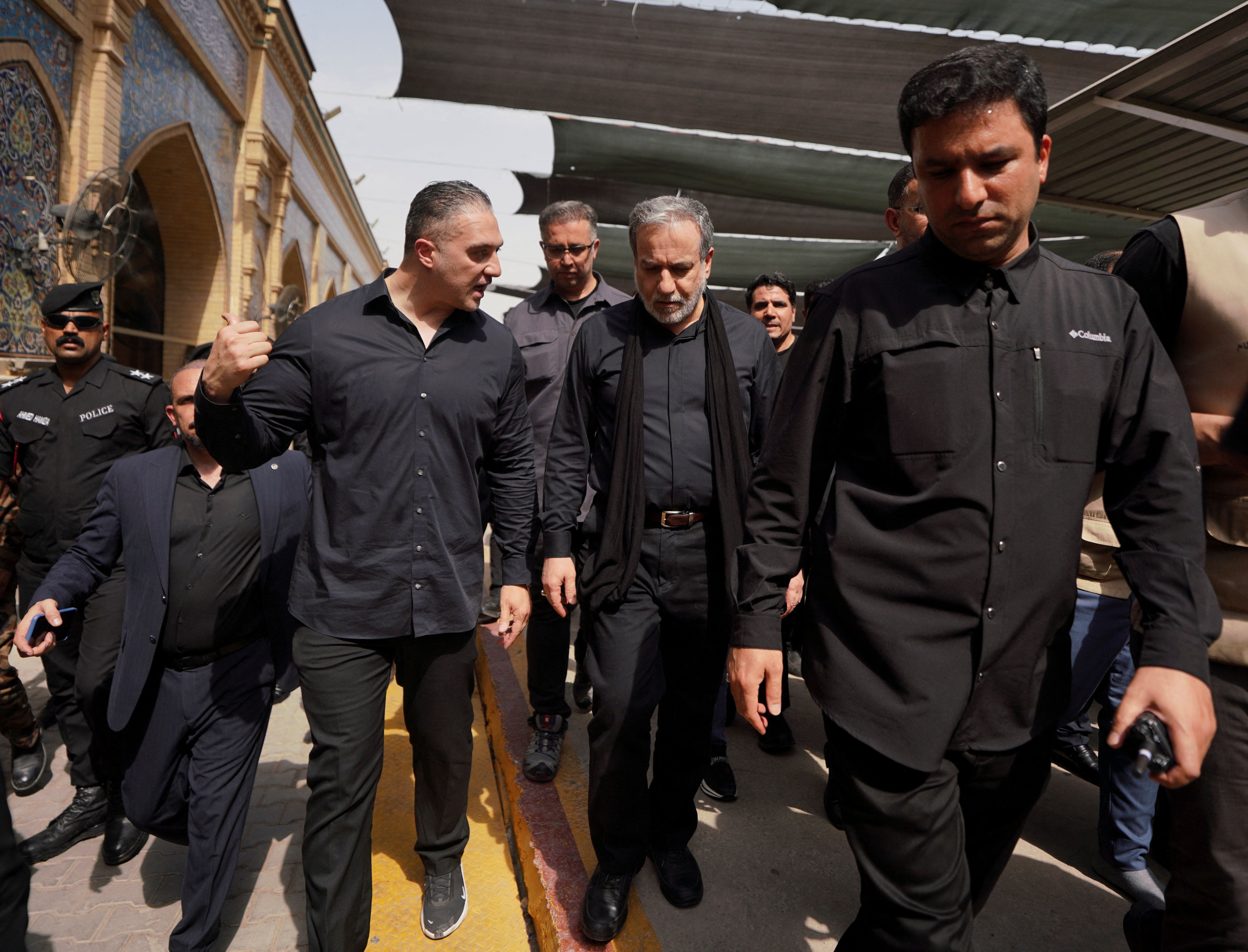 Iranian Foreign Minister Abbas Araghchi walks during a visit to Najaf, Iraq, on August 3, 2026. 