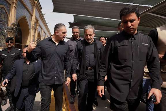 Iranian Foreign Minister Abbas Araghchi walks during a visit to Najaf, Iraq, on August 3, 2026.