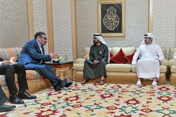 Iran's Supreme National Security Council secretary Ali Shamkhani (left) and UAE Vice President Mohammed bin Rashid Al Maktoum (center)