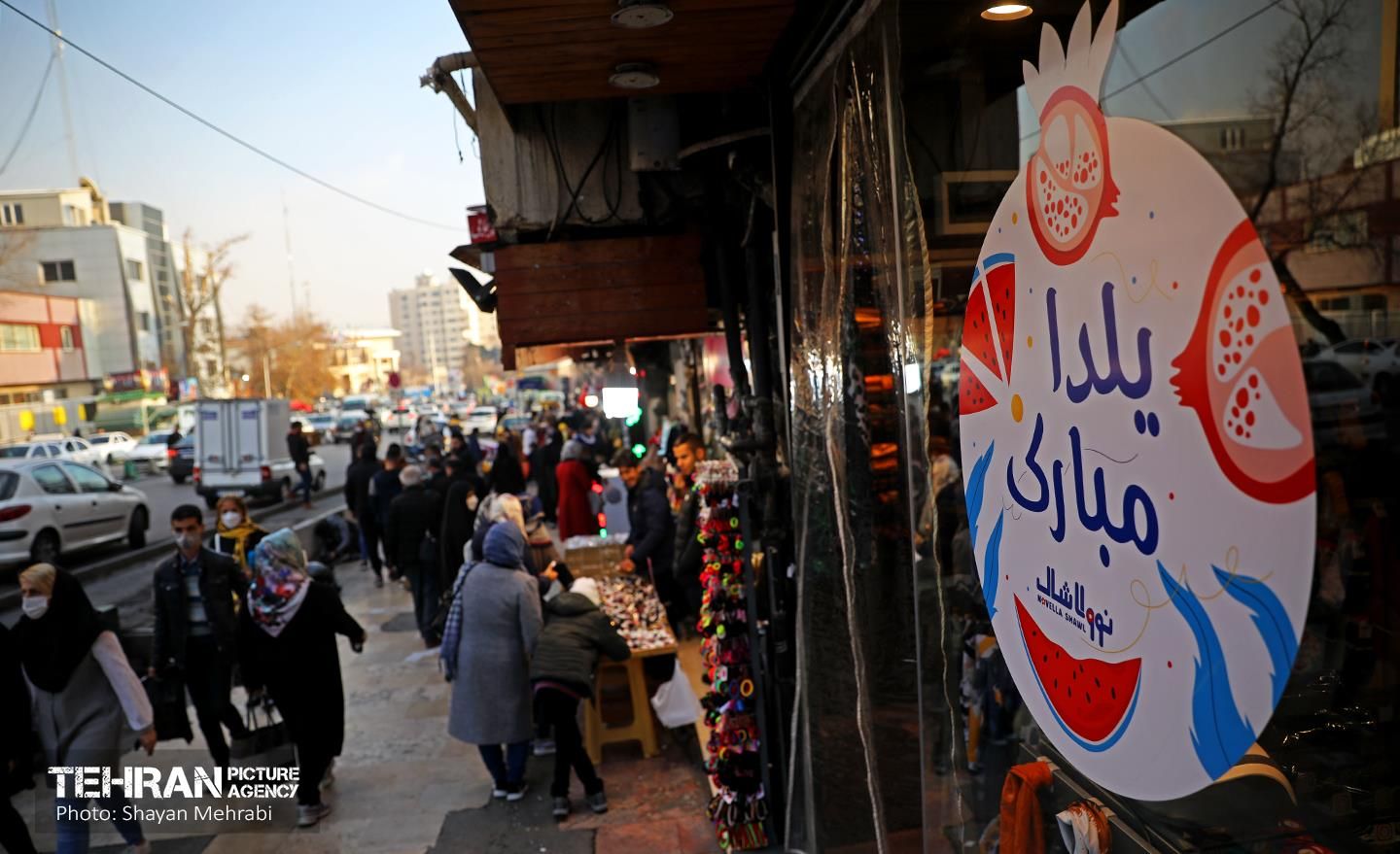 Iranians shopping for the winter solstice festival called Yalda in Persian at Tajrish bazaar in Tehran   