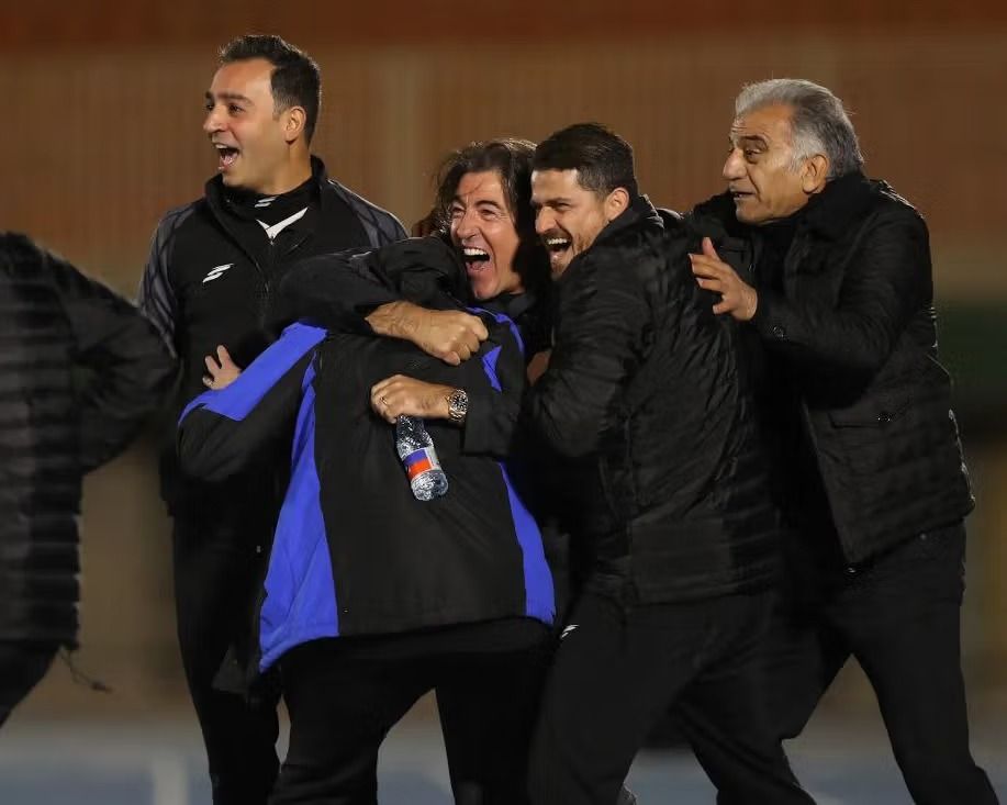 Coaches of Esteghlal F.C. react after a goal was disallowed against Tractor S.C. on January 18, 2026, as the Islamic Republic continues its deadly crackdown on Iranian youth.