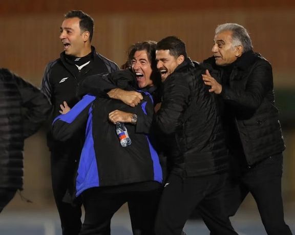 Coaches of Esteghlal F.C. react after a goal was disallowed against Tractor S.C. on January 18, 2026, as the Islamic Republic continues its deadly crackdown on Iranian youth.