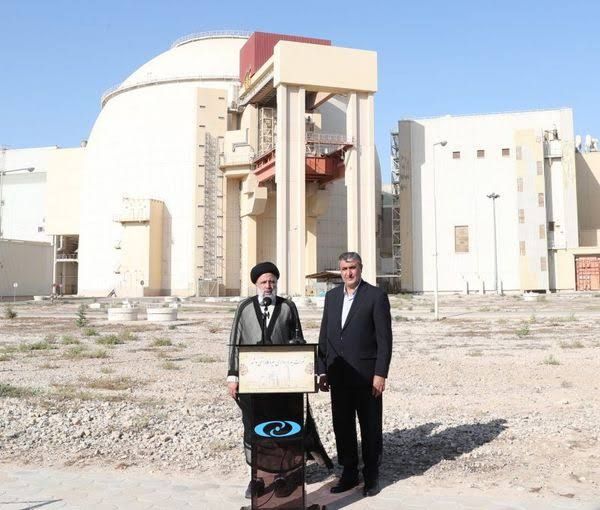 Iranian President Ebrahim Raisi (left) and head of Iran's Atomic Organization Mohammad Eslami during a visit to Bushehr nuclear power plant, in the city of Bushehr, southern Iran (undated) 