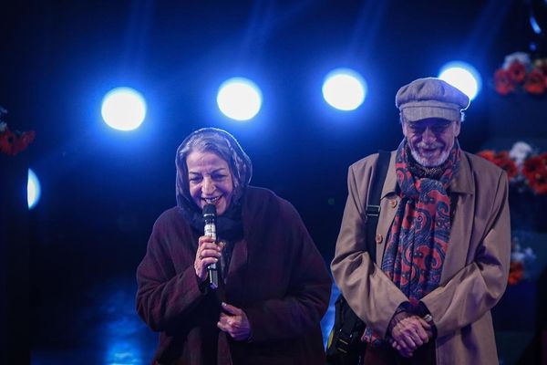 Iran files case against two actors for shaking hands at film festival