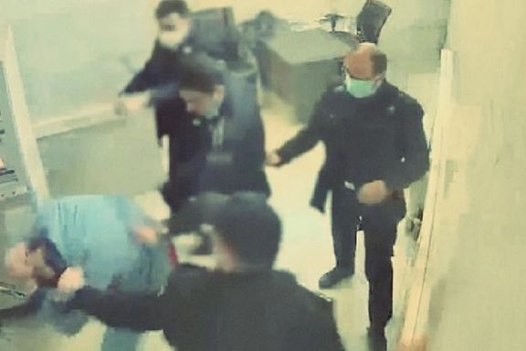 Screen shot of a video released by hackers last year showing beating of prisoner in Tehran's Evin prison.