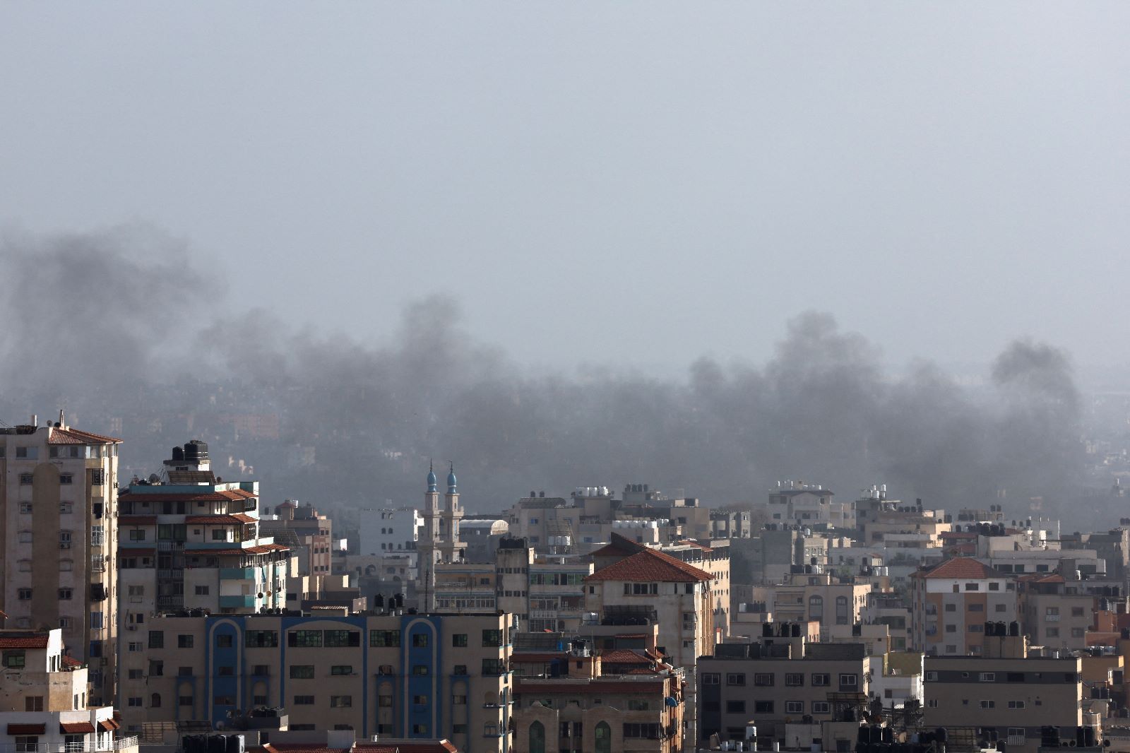 Smoke billows following Israeli strikes launched into Gaza on May 13, 2023.