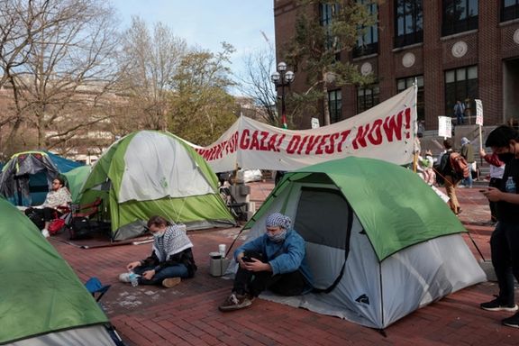 A coalition of University of Michigan students rally at an encampment to pressure the university to divest its endowment from companies that support Israel in its fight against the Palestinian Islamist group Hamas, Michigan, April 22, 2024.
