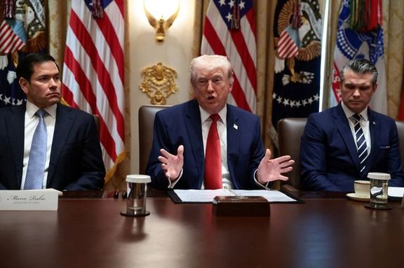 US President Donald Trump, sitting next to Secretary of State Marco Rubio and Defense Secretary Pete Hegseth, speaks during a cabinet meeting at the White House, March 26, 2026.