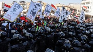 Iran-Backed Militia Threaten US Forces After Sanctions On Iraqi Banks