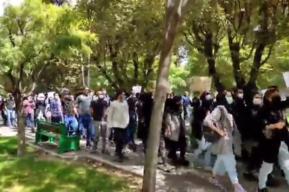 Screen grab from a video showing university students protesting in Tehran on Monday
