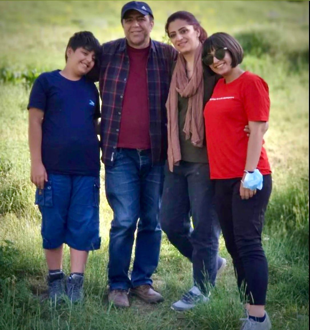 Young poet Parnia Abbasi and her family 