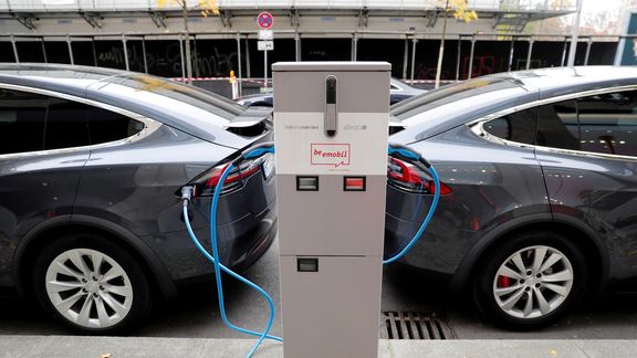 Tesla Model X electric cars recharge their batteries in Berlin, Germany, November 13, 2019.