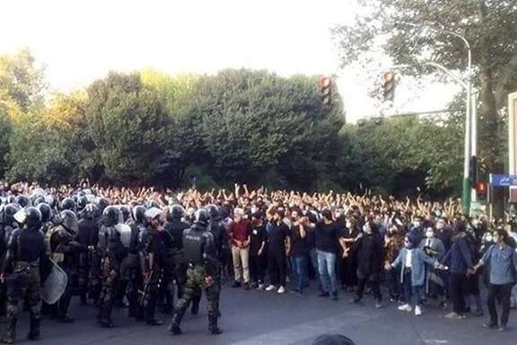 A scene from hundreds of anti-riot security forces confronting protesters in Tehran on September 19