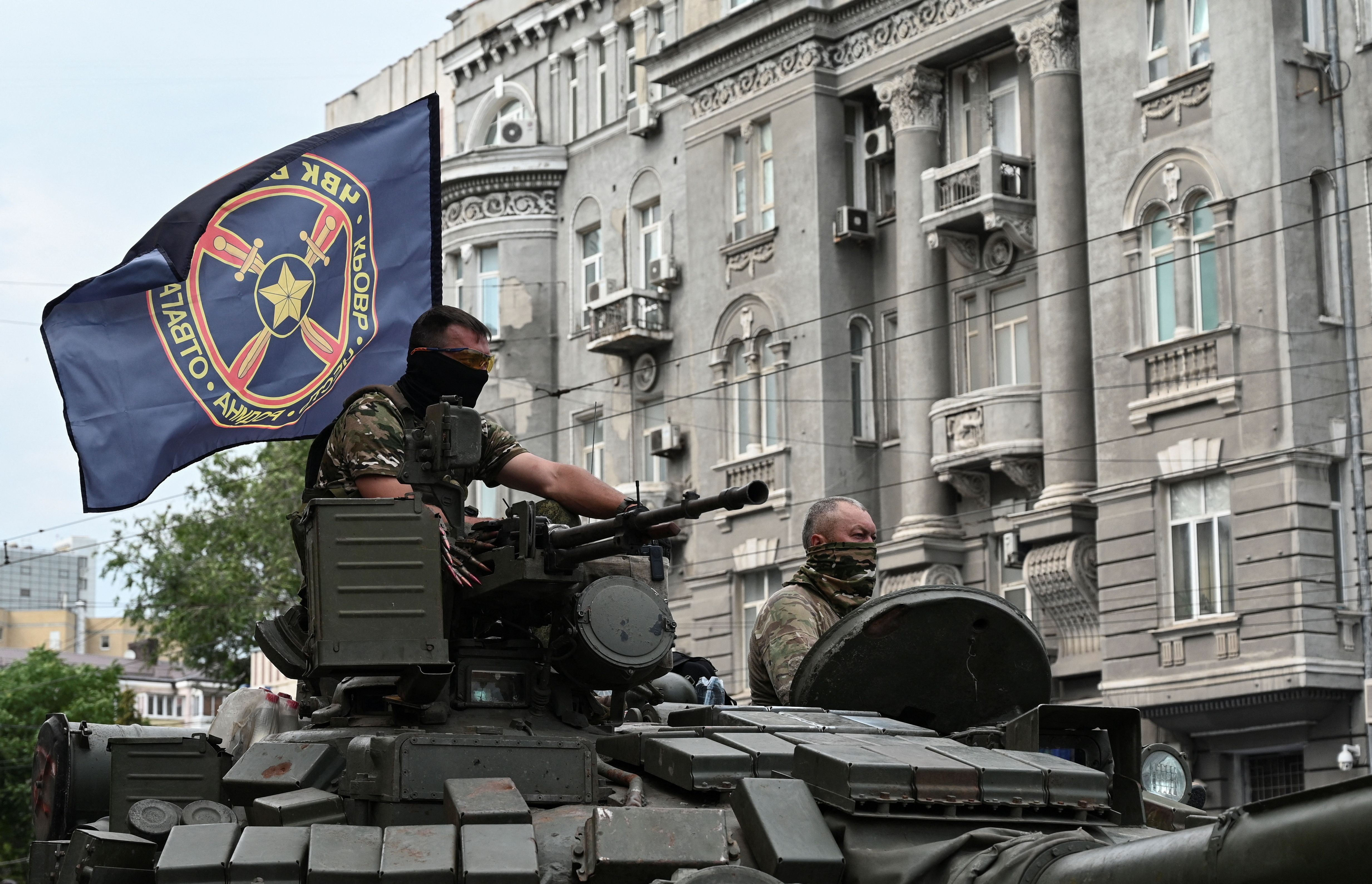 Fighters of Wagner private mercenary group are seen atop of a tank while being deployed near the headquarters of the Southern Military District in the city of Rostov-on-Don, Russia, June 24.