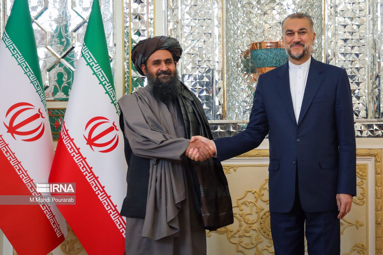 Afghanistan’s First Deputy Prime Minister for Economic Affairs Abdul Ghani Baradar (left) and Iran’s Foreign Minister Hossein Amir-Abdollahian in Tehran on November 5, 2023 