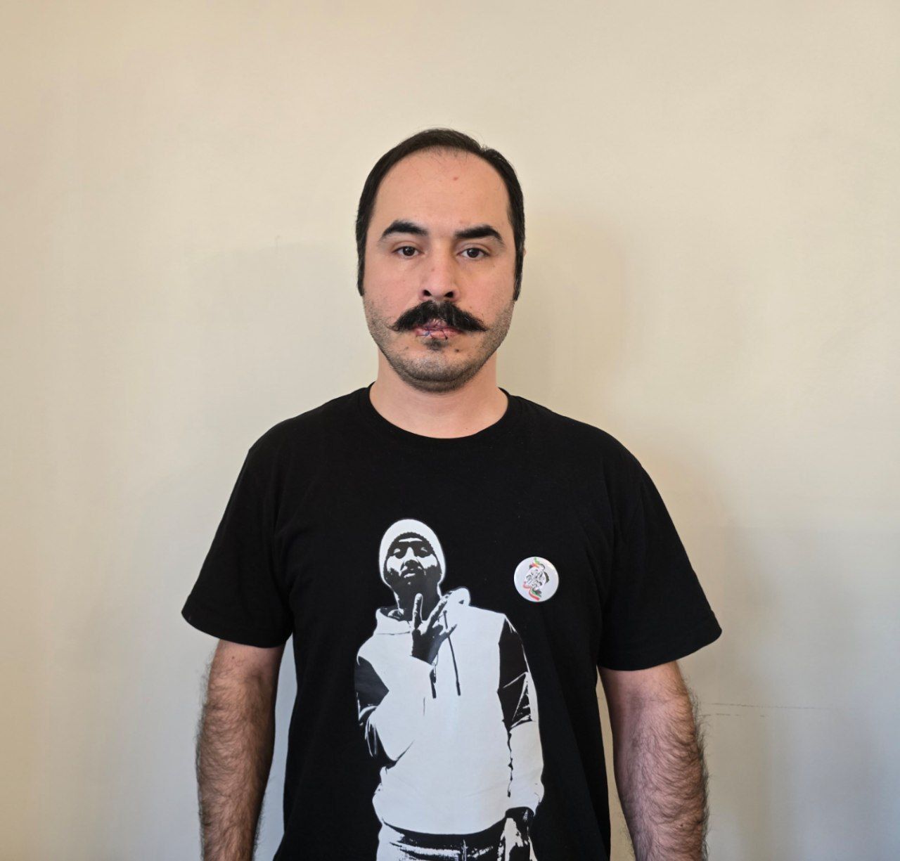 Prominent Iranian dissident Hossein Ronaghi was arrested and later released after holding a sit-in protest in Tehran.