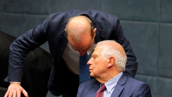 EU foreign policy chief Josep Borrell speaking with his top aide Enrique Mora during his meeting with Iran's foreign minister Amir-Abdollahian in Jordan on December 20, 2022