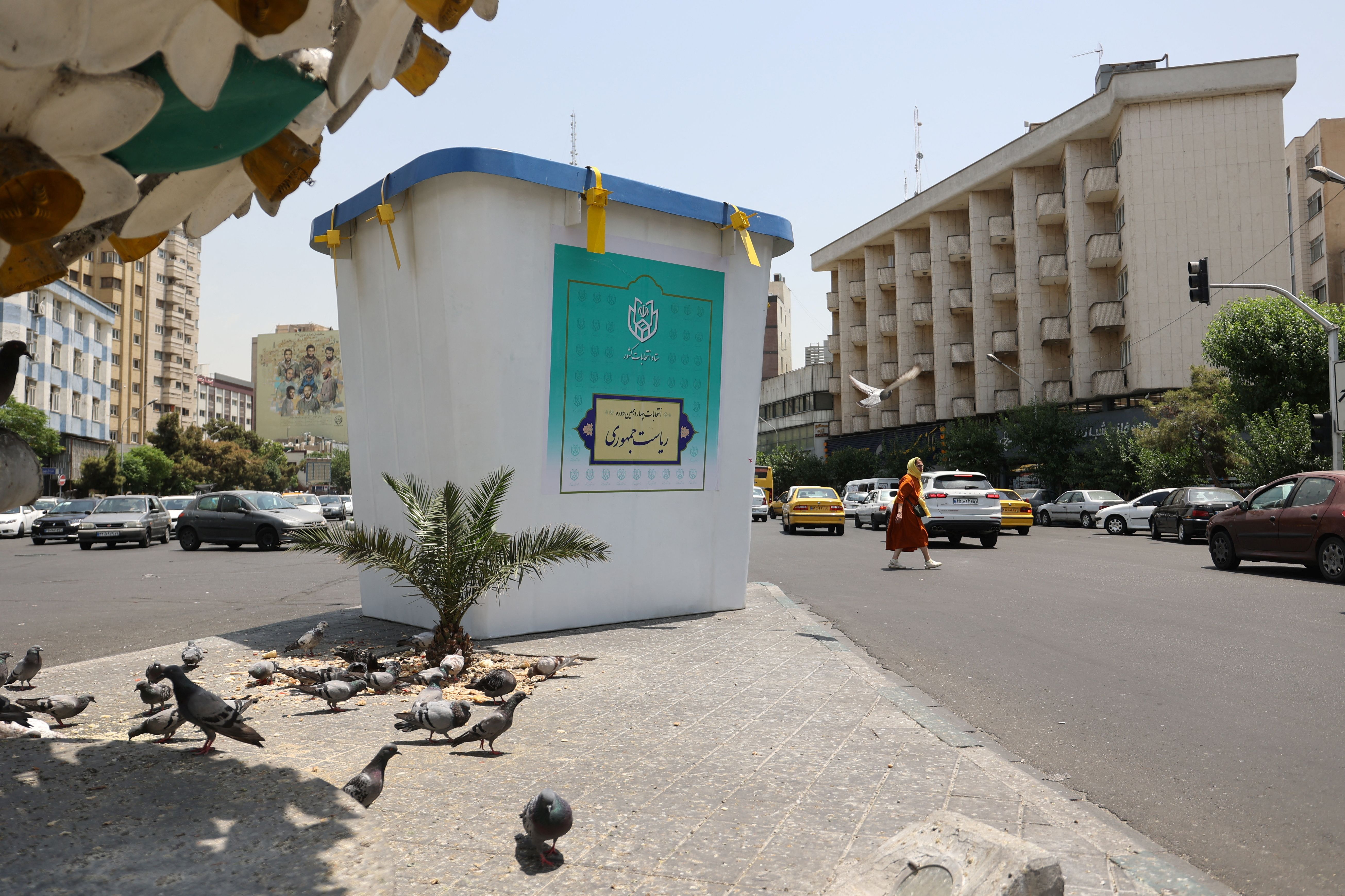 A model of a ballot box is being placed on an avenue in downtown Tehran, Iran, on June 15, 2024, amidst the early presidential election campaigns. 