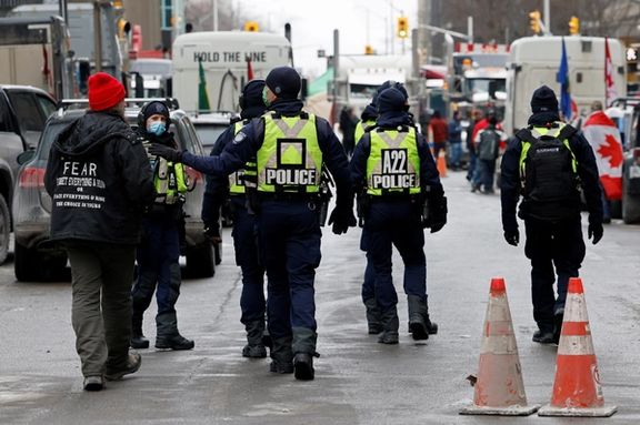 Police officers patrol downtown streets in Ottawa, Ontario, Canada.