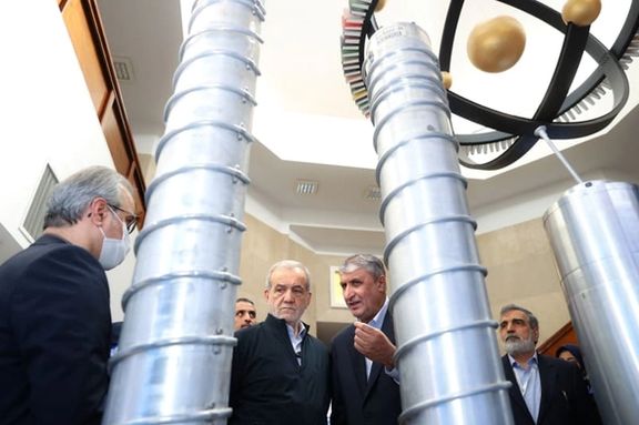 Iran's president Masoud Pezeshkian visiting a nuclear facility, accompanied by atomic agency chief Mohammad Eslami, Spring 2025