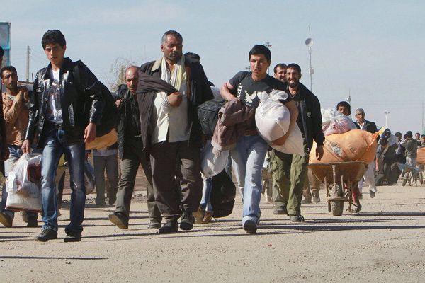 Government Moves Spark Concerns Of Afghan Mass Naturalization In Iran
