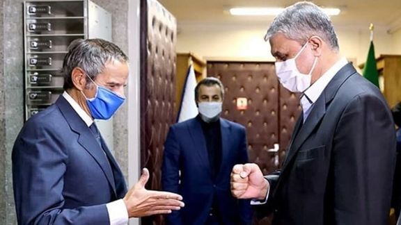 Rafael Grossi (L) meeting with the Iranian nuclear cheif Mohammad Eslami on March 5, 2022