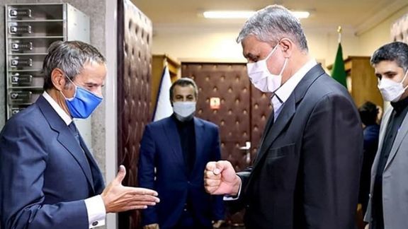 Rafael Grossi (L) meeting with Iran's nuclear chief Mohammad Eslami in Tehran in March 2022