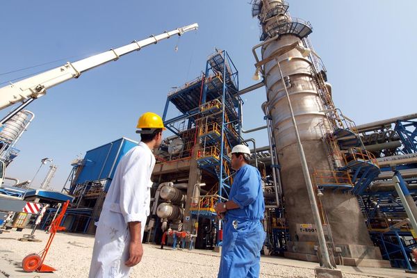 Scores of Iranian oil workers fired over wage protests