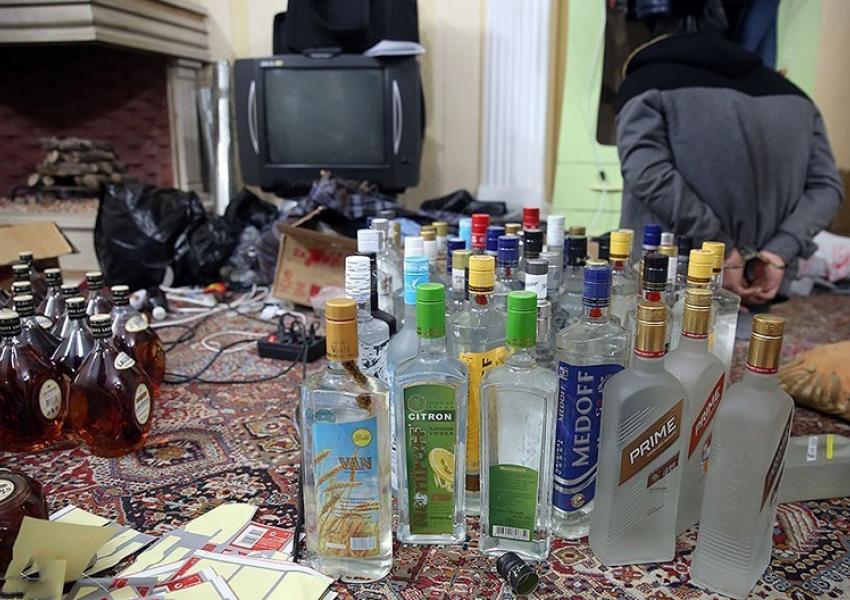 Police seize illegal alcohol during a raid. (File photo)
