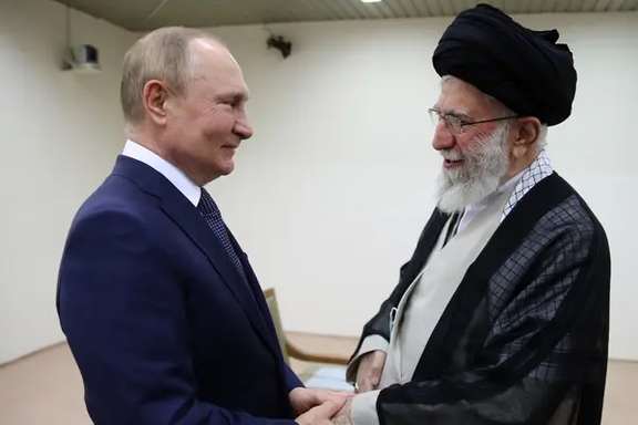 Iran's Khamenei warmly greeting Russia's Putin in Tehran on July 19, 2022