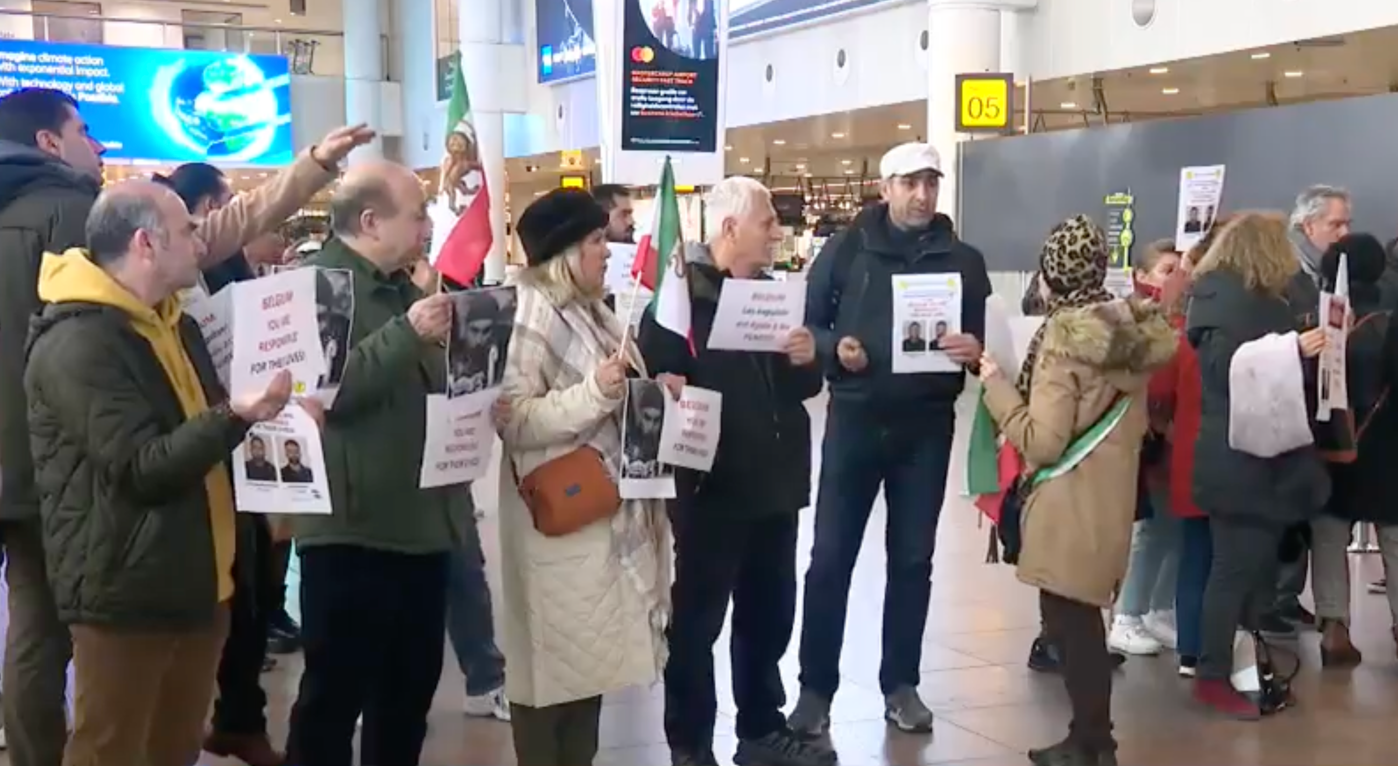 People Gather In Brussels Airport To Stop Deportation Of Two Iranian Asylum Seekers