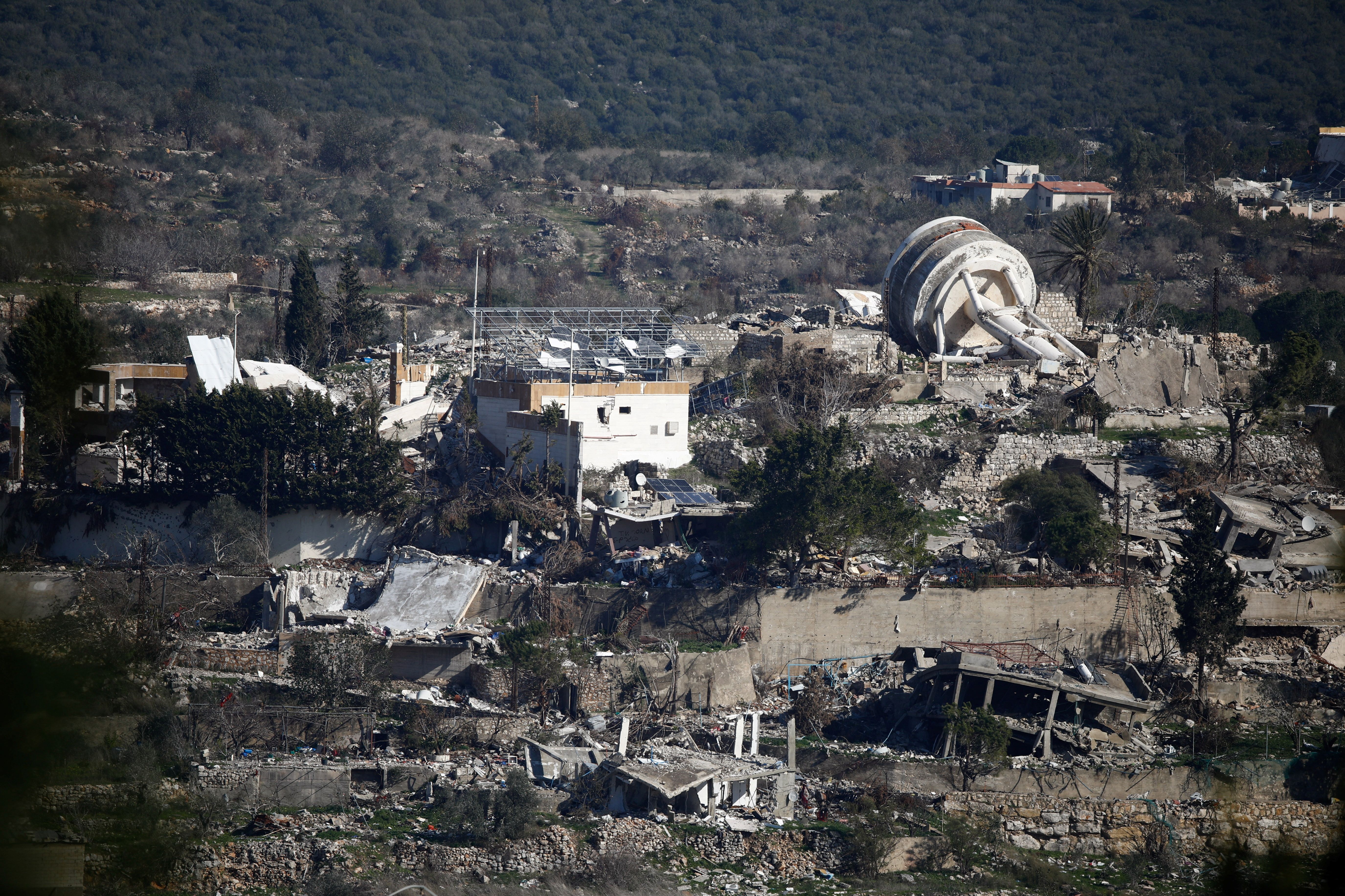 Damaged houses are seen in southern Lebanon, after the ceasefire between Israel and Hezbollah, as seen from northern Israel, January 13, 2025.