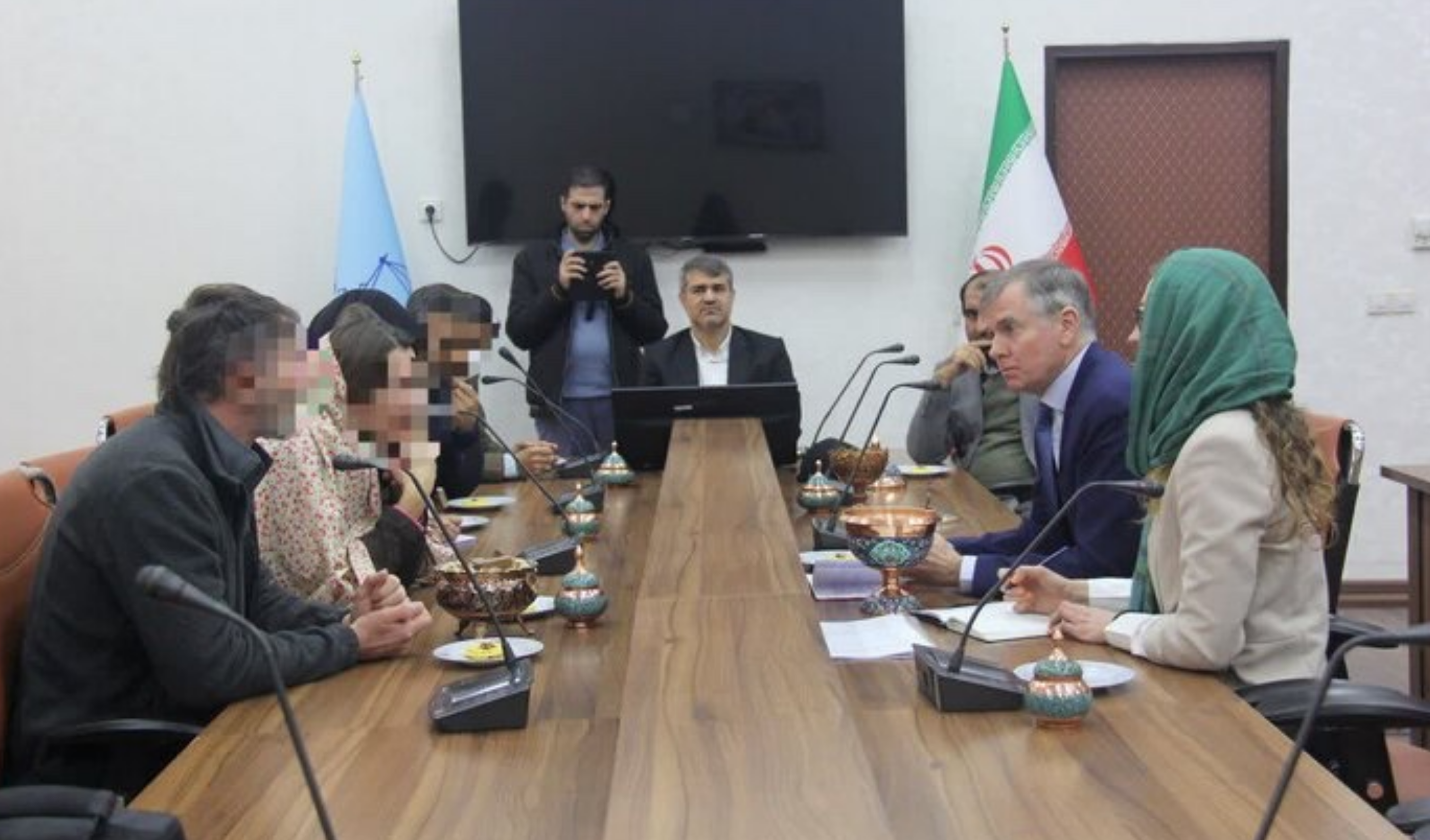 IRNA has released photos purportedly showing the two British detainees and the UK ambassador in Kerman.