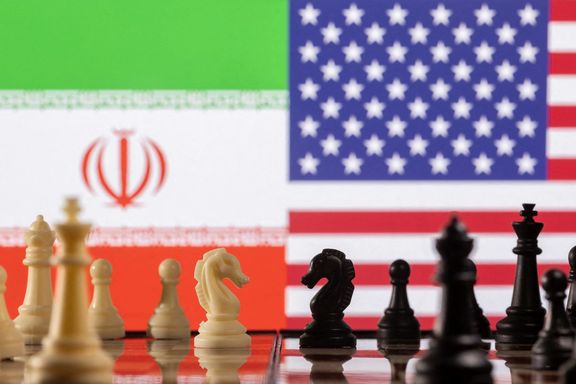 Chess pieces are seen in front of displayed Iran's and US flags in this illustration taken January 26, 2022.