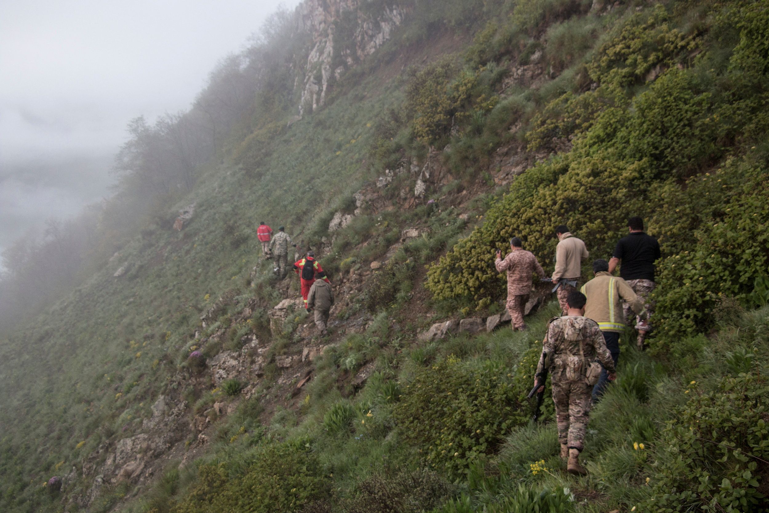 Rescue team works following a crash of a helicopter carrying Iran's President Ebrahim Raisi, in Varzaqan, East Azerbaijan Province, Iran, May 20, 2024.