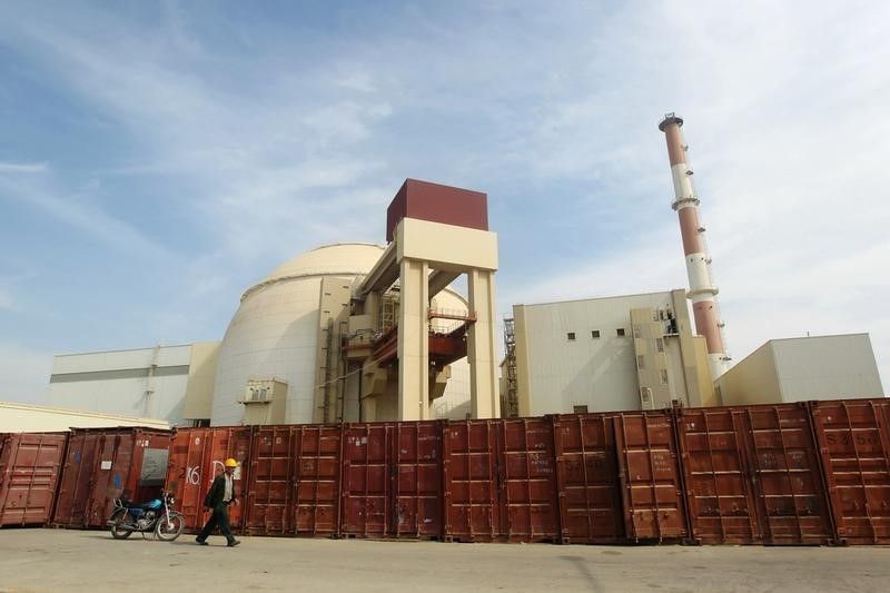 A Russian worker walks past the Bushehr nuclear power plant. 