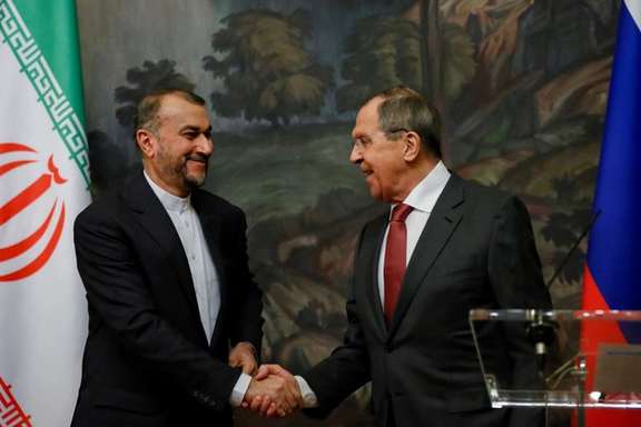 Russian Foreign Minister Sergei Lavrov shakes hands with Iranian Foreign Minister Hossein Amir-Abdollahian during a news conference following their meeting in Moscow, Russia March 29, 2023.